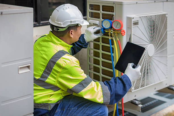 Professional Heat Pump Repair technician working in Destrehan, LA